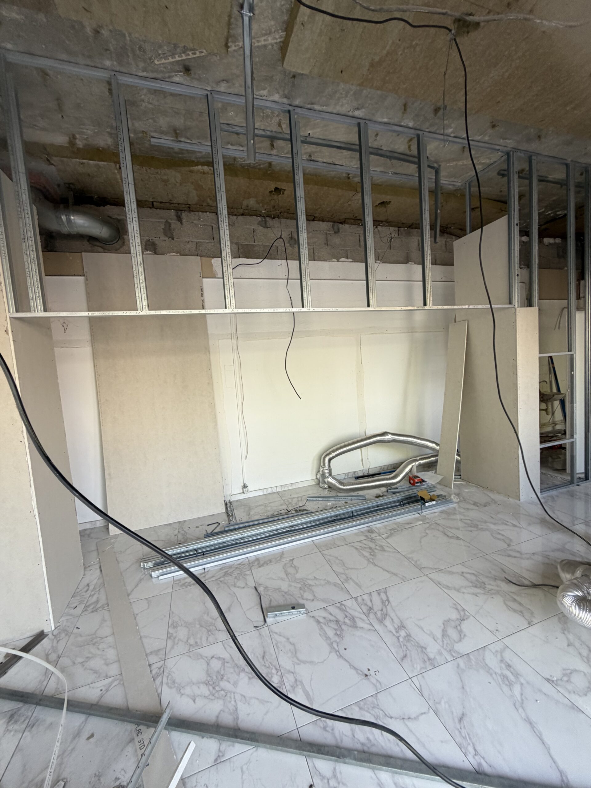 Résultat rénovation laverie Décines TC Bâtiment